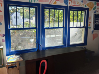 blue painted window trim in play room