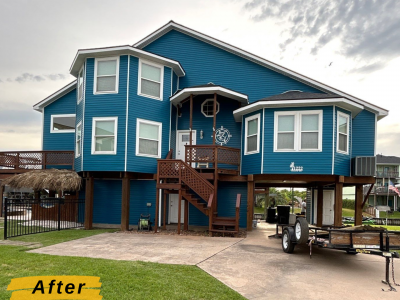 house with blue painted siding