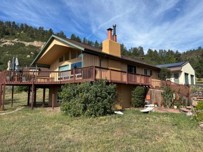 painted exterior of house with wood siding