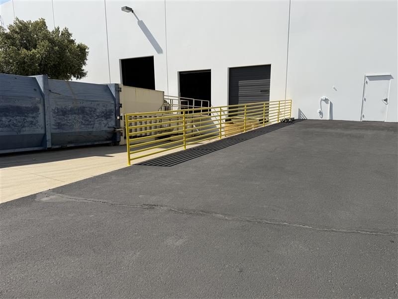 repainted exterior docking area of warehouse Preview Image 3
