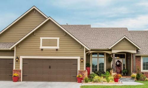 Full Exterior Siding, Eave Trim, and Overhead Garage Door Painting