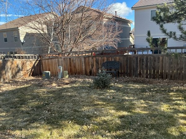 unstained wooden fence in home backyard Preview Image 4