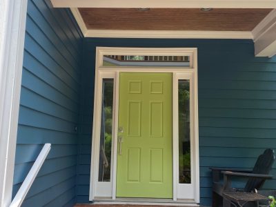 Front door painted yellow by certapro painters of chapel hill