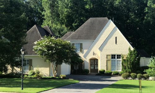 Exterior Painting in a light shade of yellow.