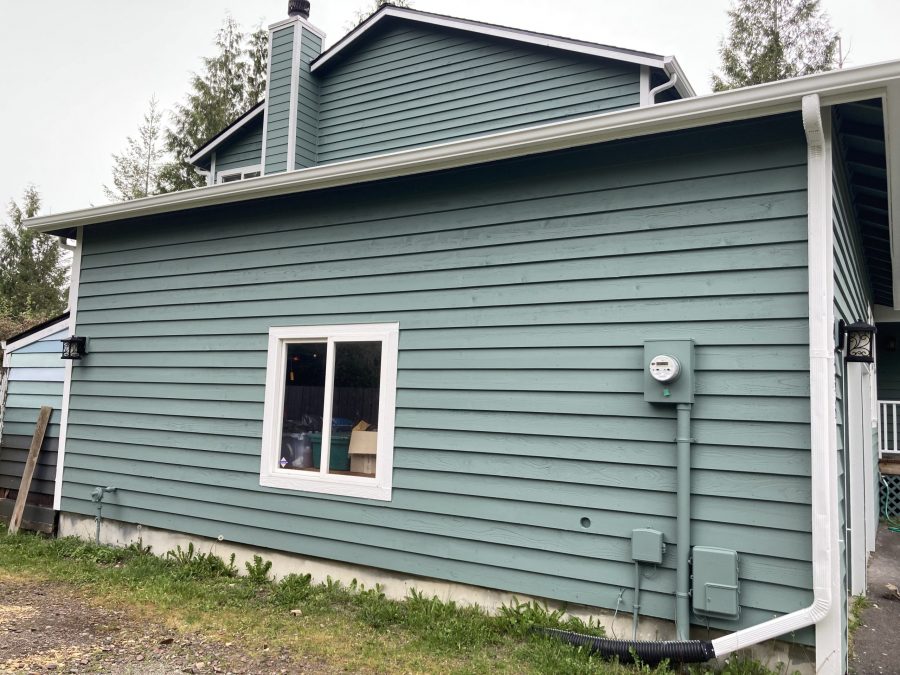 Wood Siding Repainted from gray to green Preview Image 3