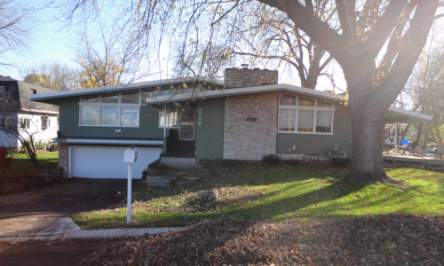 Green and White Exterior Painting
