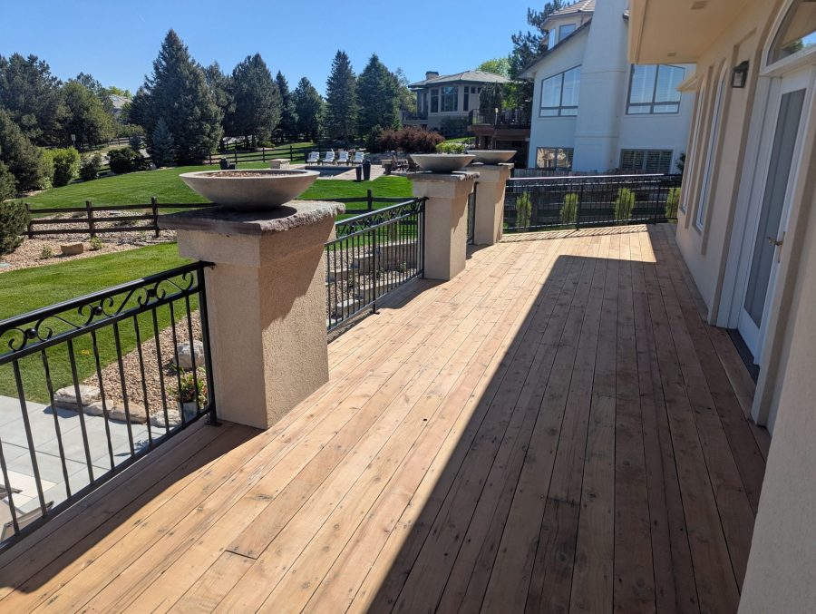 stripped wooden deck with metal railing Preview Image 9