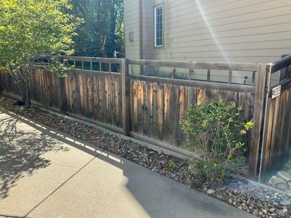 wooden fence with worn dark stain Preview Image 4