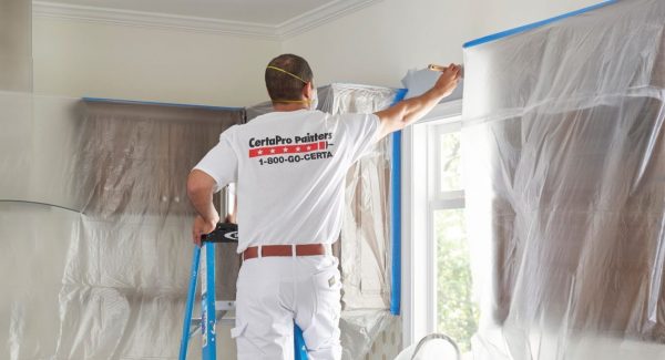 Certapro employee working with professional tools