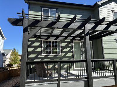 stained wooden pergola