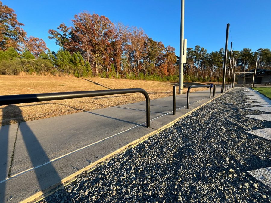 black painted poles at football field Preview Image 3