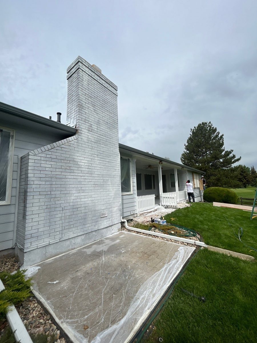 ranch home exterior with brick being painted Preview Image 8