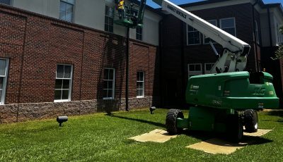 Catholic High School exterior painting and prep commercial project.