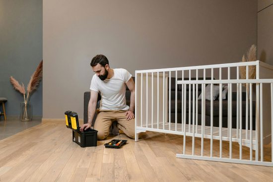 man repairing furniture