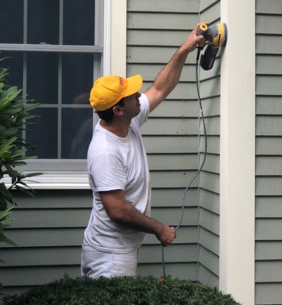 sanding a home to prep for painting project