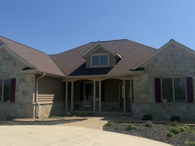 Sheboygan Falls Wisconsin home exterior after solid stain on rough cedar siding