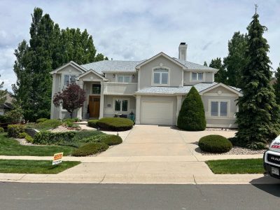 front of painted stucco home