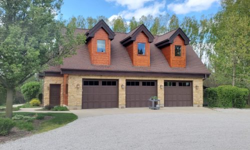 Exterior Garage Door Enameling, Amber Wood Siding, and Eave Finishing