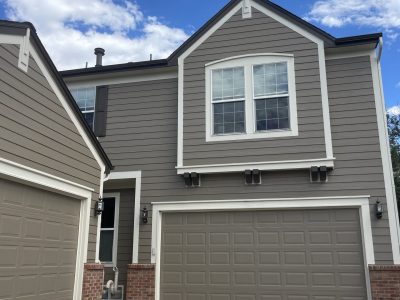 exterior and garage door after residential repaint