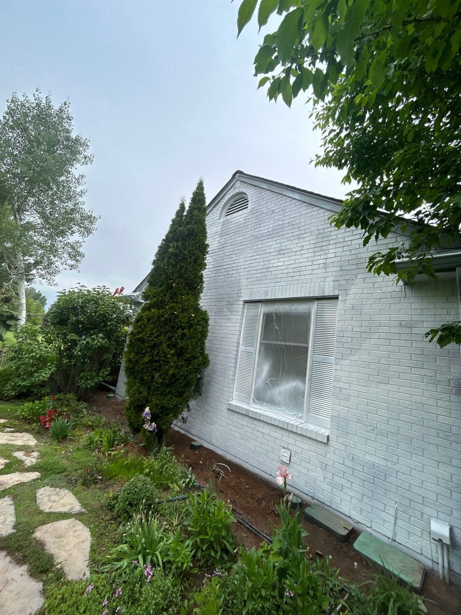exterior of brick home painted white Preview Image 6