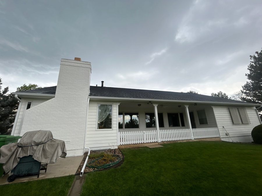 exterior of brick home painted white Preview Image 4