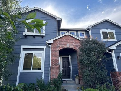 house with blue painted siding