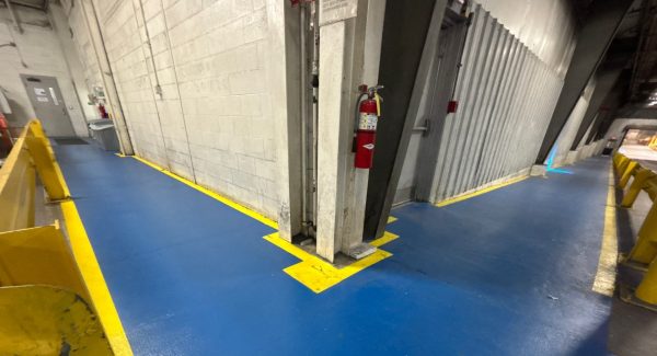 blue and yellow painted warehouse walkway flooring