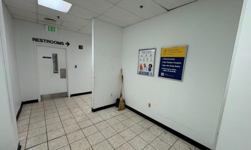 Tired Restroom Corridor Walls