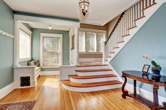 blue walled staircase entry way