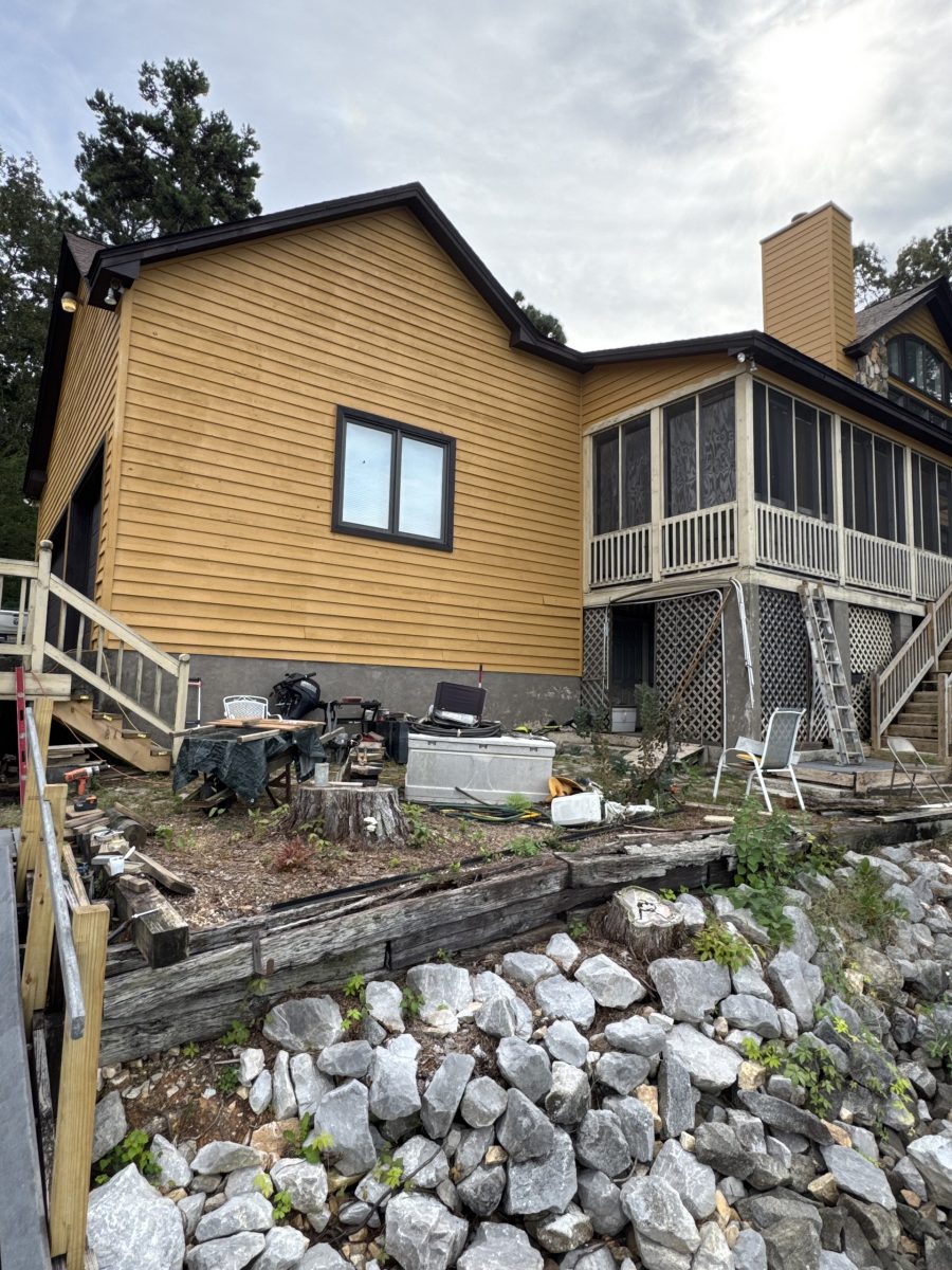 Rear corner of a Dadeville lake house after exterior painting with continuous fresh siding color Preview Image 5