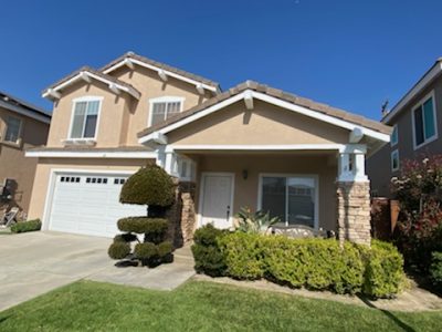 stucco house after being repainted by CertaPro.