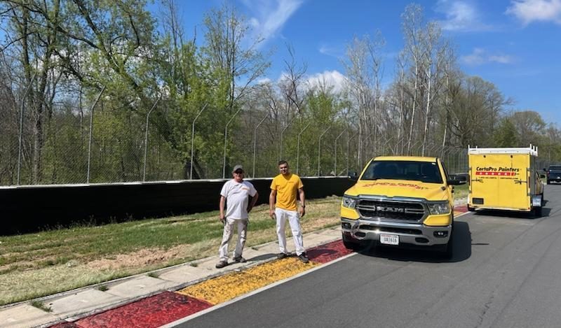CertaPro painting the two metal crash walls at Road America Preview Image 5