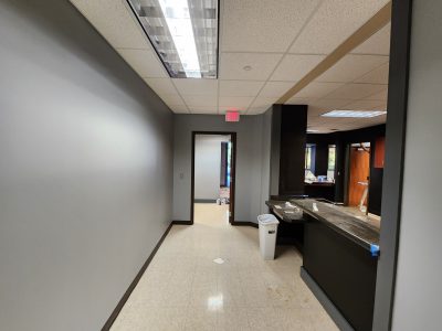 Black Common Area Space with Gray Hallways