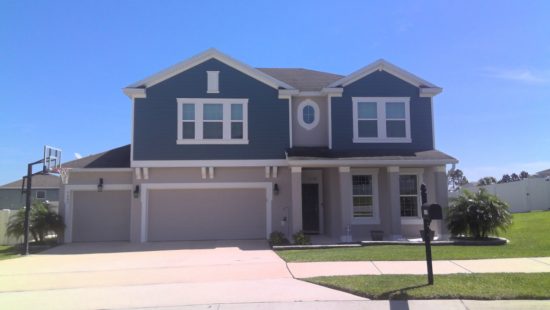 medium house exterior painting cost
