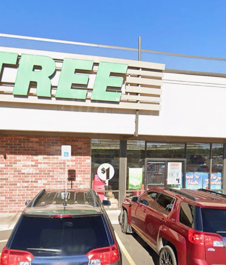 cars parked in front of shopping center Preview Image 10