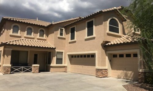 Stucco Home Cloudy Sky