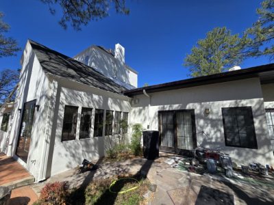 house with white exterior and black trim