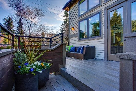 deck staining cost