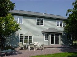 Two-Story Rear Lap Siding and French Door Trim Painting