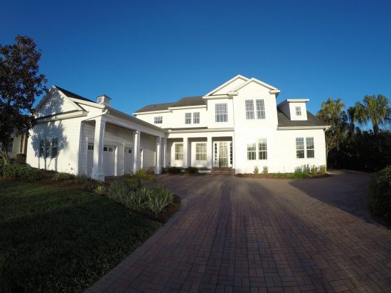 Freshly painted Ponte Verde Beach white house during sunset