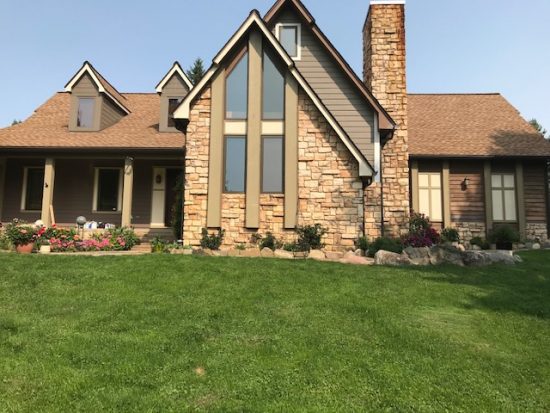 Exterior house siding repainted.