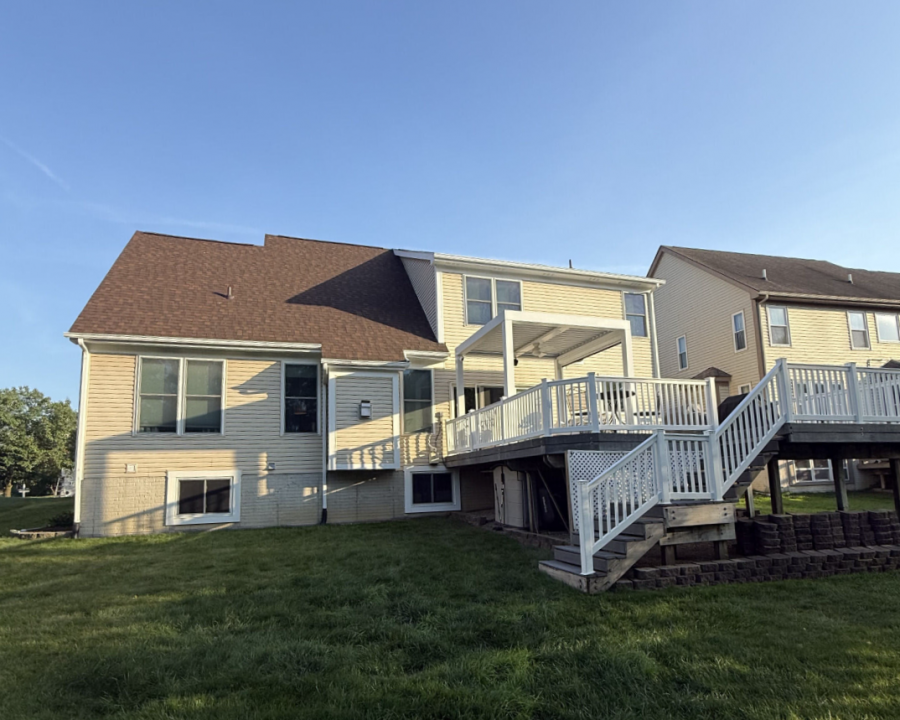 house exterior with off white siding and white trim and railing accents Preview Image 1