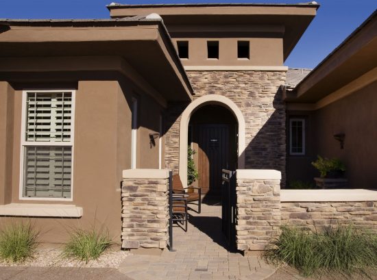 entryway into arizona home with brown stucco
