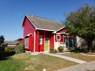 Red Repaint of entire exterior of house