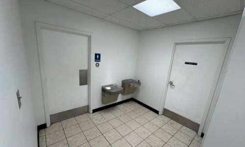 Scuffed Back-of-House Corridor