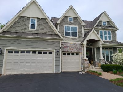 residential exterior painting for two garage home