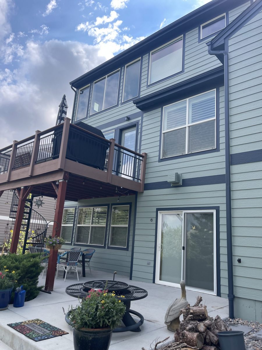 painted house exterior with light seafoam green siding and navy trim Preview Image 2