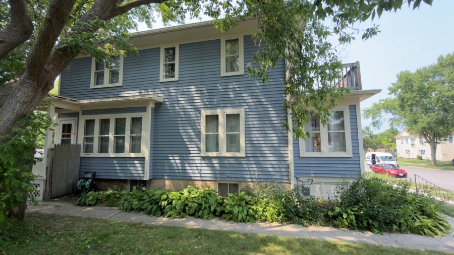 soft blue painted wood siding and off white trim home exterior Preview Image 1