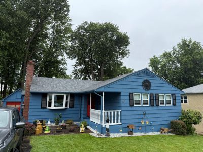 house with blue painted siding