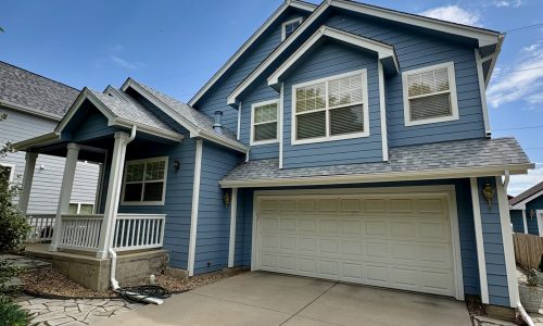 Blue Exterior Siding with White Trim